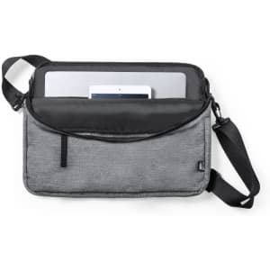 A grey laptop bag with a shoulder strap, featuring a front pocket and a laptop inside. It has a logo.