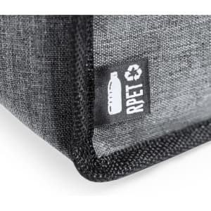 A grey cooler bag with a textured finish and a small logo tag featuring recycling symbols.