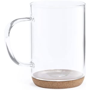 A clear glass mug with a cork base and a handle. The design is simple and modern.