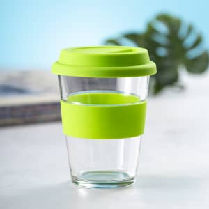 A drink cup with a clear body and bright green lid and silicone band, featuring a sleek design and a logo.