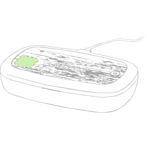A wireless charger sterilizer box in white with a wooden texture on top and a green indicator light.