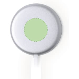 A round wireless charger in silver with a green charging area and a white cable. It features a logo on its surface.