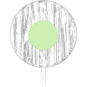 A round wireless charger with a wood grain design and a central green circle, featuring a cable attached.