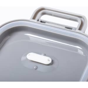 A grey thermal lunch box with a handle on top and a smooth, glossy interior surface. It features a small white label.