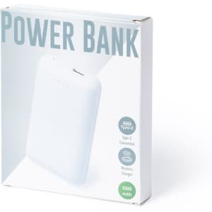 A white power bank in packaging, featuring a Type-C connection and wireless charging capability.