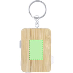A bamboo keychain featuring a blank rectangular area for customisation, attached to a metal ring.