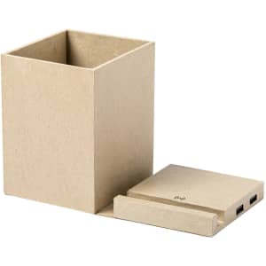 A beige multifunction pencil holder with a wireless charger base and USB ports on the side.