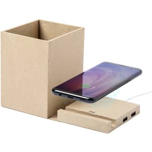A multifunction pencil holder in natural beige with a wireless charger and phone placed beside it.