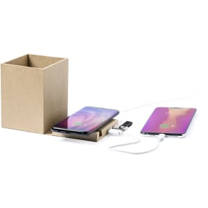 A kraft paper pencil holder charging two smartphones with a USB connection. Features a minimalist design in natural tones.
