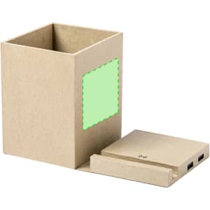 A brown cardboard pencil holder with a removable base featuring a charging pad and USB ports.