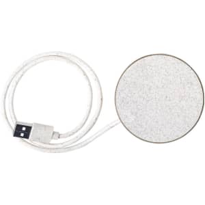 A round white wireless charger with a USB cable attached, featuring a textured surface and a simple design.