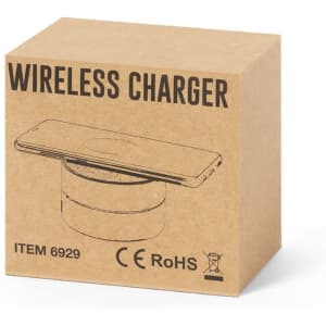 A brown cardboard box containing a wireless charger, with a minimalist design and a circular charging surface illustration.