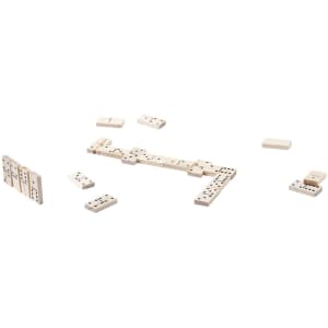 A set of ivory-coloured dominoes arranged in various positions, with some pieces scattered around the central layout.