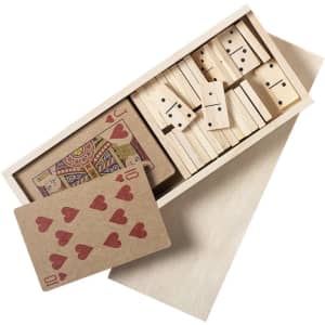 A wooden box contains playing cards and dominoes, featuring red, brown, and natural wood tones.