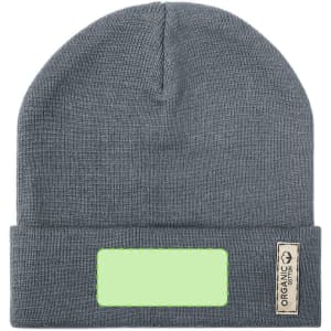 A grey beanie featuring a folded cuff and a decorative label. The label has a blank area.