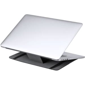 A sleek silver laptop positioned on a black stand. The stand has a minimalist design and an angled base.