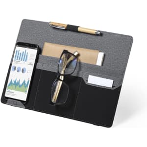 A grey and black organiser features compartments for a phone, glasses, cards, and a pen.