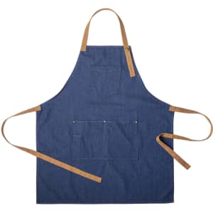 A blue denim apron with tan straps and a front pocket, featuring a logo on the chest area.