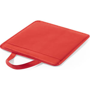 A red cushion with a textured surface and a handle on one side. It has a simple, minimalist design.