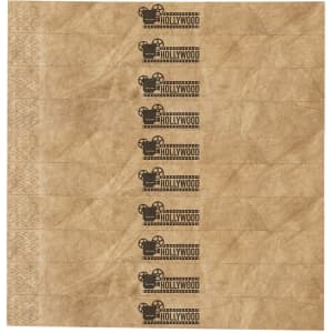 A set of brown event wristbands featuring black film reel designs and a Hollywood theme, arranged neatly.