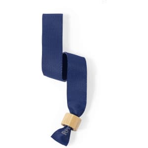 A navy blue wristband made of fabric with a wooden fastening. Features a logo on the wooden element.