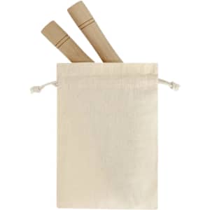 A natural canvas bag containing two wooden skipping ropes with markings on the handles.