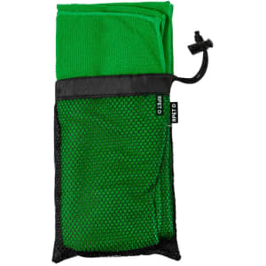 A green absorbent towel packaged in a black mesh bag, featuring a drawstring closure.