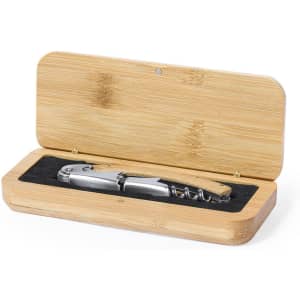 A drink bottle corkscrew opener in a wooden box, featuring a silver metal body and a wooden handle.