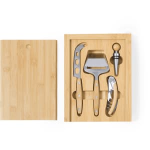 A bamboo box containing a cheese knife, a cheese slice, a corkscrew, and a wine pourer in stainless steel.