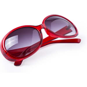 Red sunglasses with dark lenses and a sleek, modern design, featuring a logo on the arm.