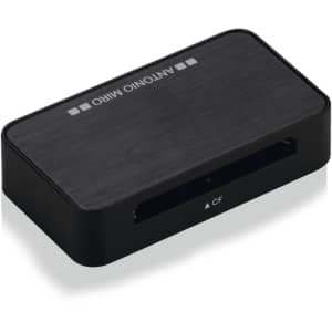 A black card reader with a sleek design and a slot for Compact Flash (CF) cards. It features a branding logo.