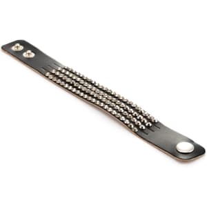 A black bracelet featuring silver studs and snap fasteners, displayed on a neutral background.