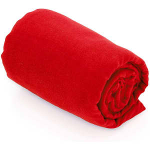A rolled red towel with a soft texture, featuring a logo on the side.