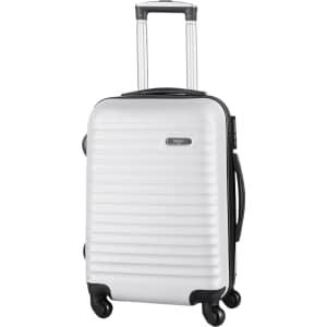 A wheeled bag in silver with a textured surface, featuring a retractable handle and multiple wheels for easy manoeuvrability.