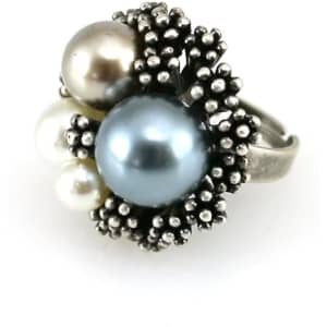 A silver adjustable ring featuring three large decorative pearls in shades of blue, grey, and white.