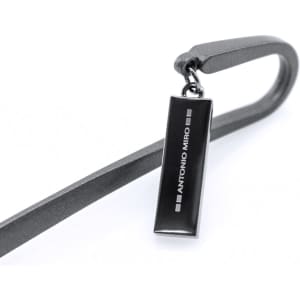 A sleek black bookmark with a decorative pendant. The bookmark has a hook design and features a logo.