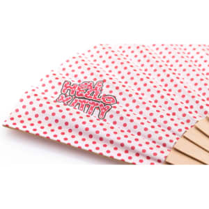 A hand fan featuring a polka dot design in pink and white, with a logo on the surface.