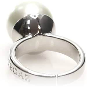 An adjustable silver ring featuring a large, glossy white pearl at the top. It has a branding logo.