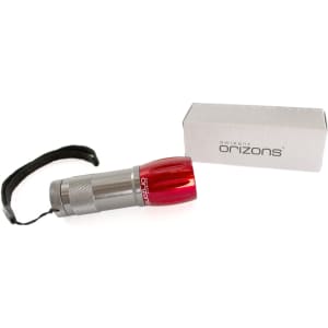 A silver torch with a red top, accompanied by a grey box, and featuring a wrist strap.