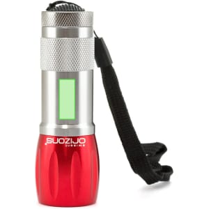 A compact red and silver torch with a textured grip and a wrist strap. Features a branding logo.