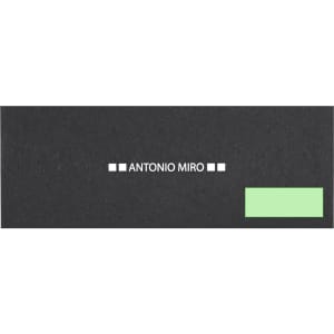 A sleek black packaging with a green accent, featuring the name "ANTONIO MIRO" on the front and a logo.