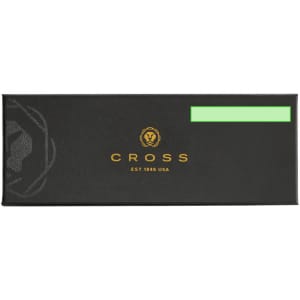 A black pen box featuring a logo, with a green accent. It is designed for a metal pen product.