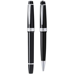 A set of two metal pens in black with silver accents and a logo on the barrel.