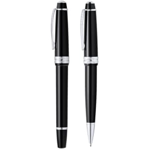 A set of black metal pens featuring silver accents, complete with a branding logo.