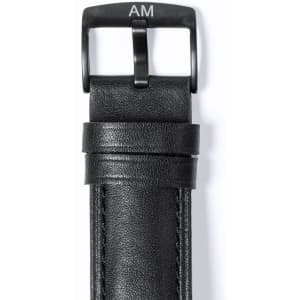 A black leather watch strap with a metal buckle, featuring a glossy finish and a branding detail.
