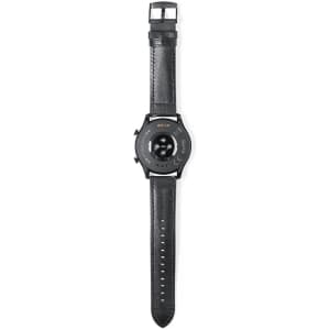 A black smart watch with a leather strap and a circular face, featuring a logo on its underside.