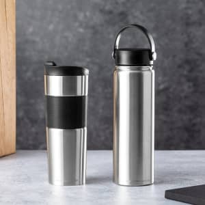 A drink bottle and an insulated travel mug in silver stainless steel, both featuring black accents and a logo.