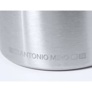 A stainless steel flask featuring a sleek, polished finish and an engraved logo.