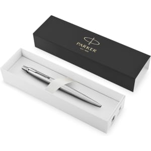 A metal pen in a sleek white box with a black outer sleeve and a logo. The pen is silver in colour.