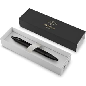 A black metal pen inside a white box with a black outer sleeve, featuring a logo on the packaging.